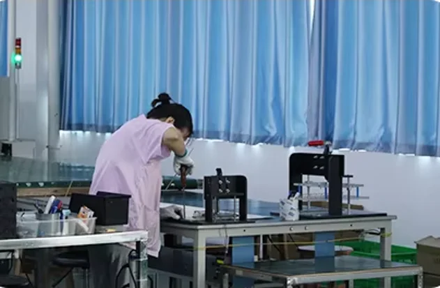 Gerixi technician at an assembly and inspection station